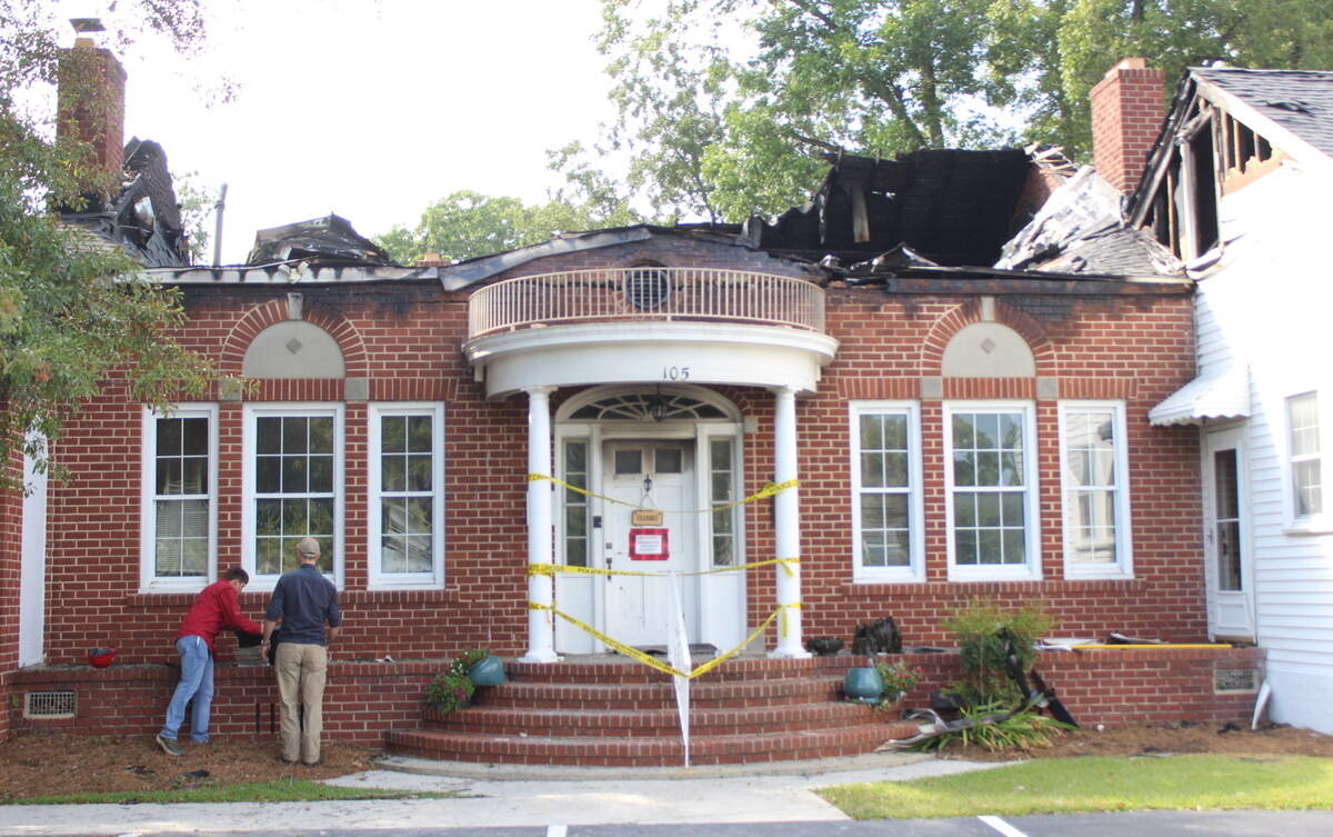 Parishioners removed objects from a front porch that were saved before a fire could destroy them at Byron, Ga. United Methodist Church on August 22, 2024. A man allegedly set the building on fire Tuesday, August 20, 2024, according to the Byron Police Department.