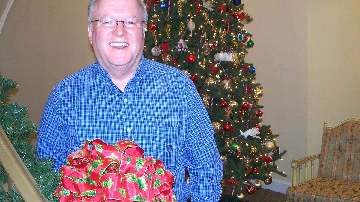 MICHAEL W. PANNELL/SPECIAL TO THE SUN NEWSBob Dilks at Central Baptist Church among one of the congregation's many decorative Christmas displays.