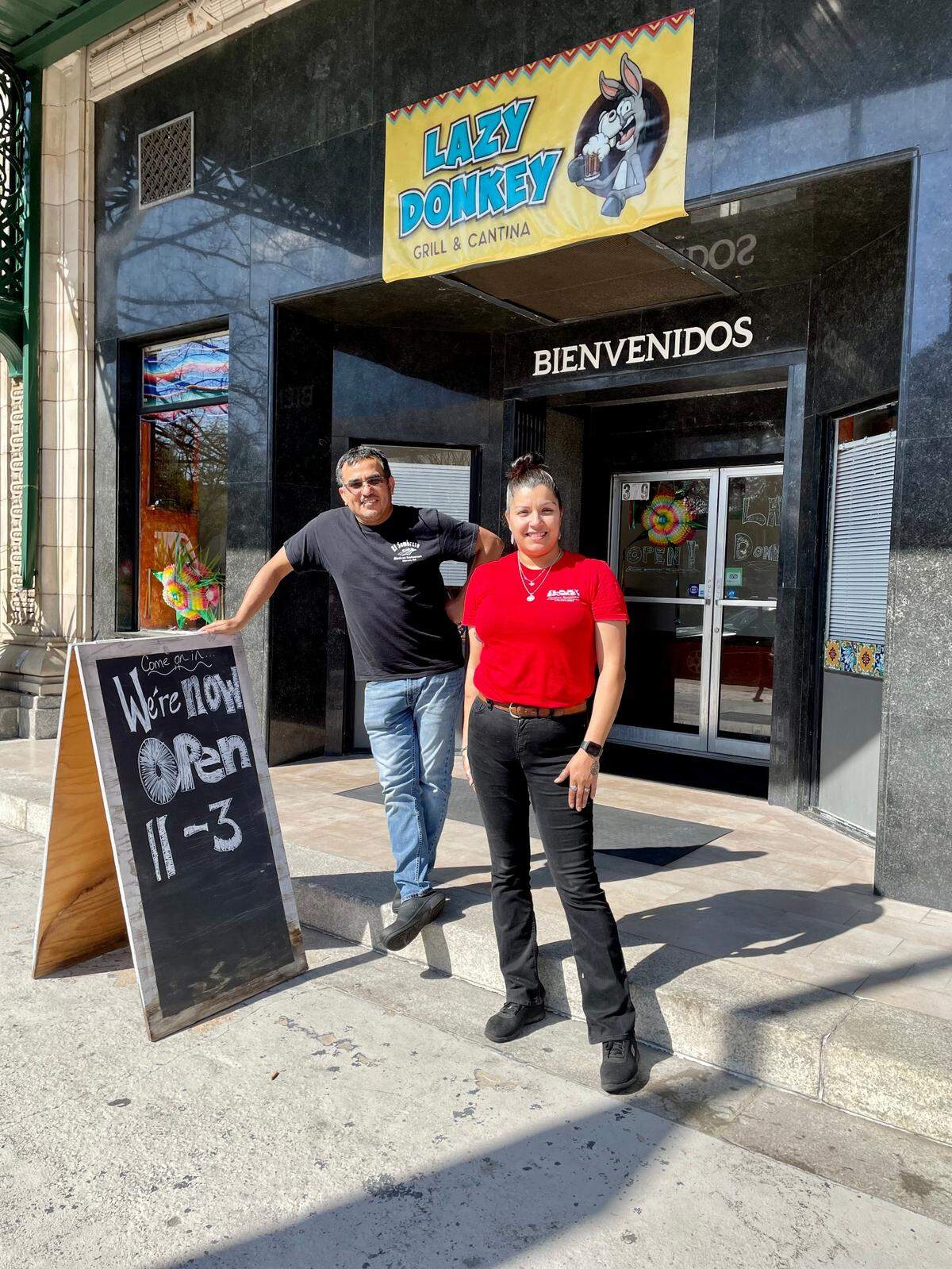 Enrique Lopez, co-owner, and worker Alex Jackson outside the Lazy Donkey, a new Mexican restaurant in downtown Macon.