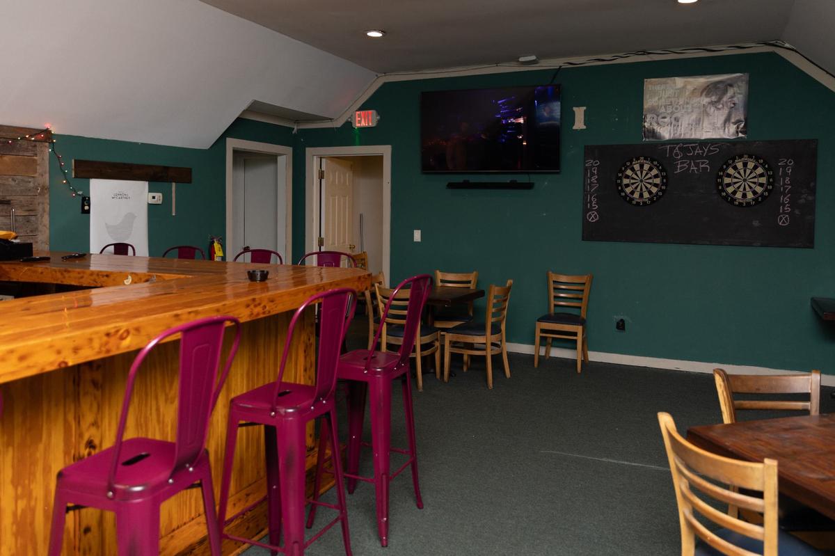 The upstairs of T & Jay’s Bar features darts and additional seating on Tuesday, May 14, 2024, in Macon, Georgia. The newly opened bar off of Zebulon Road honors the memory of Macon local Jay Fly, who passed away from cancer in 2022. (Photo/Katie Tucker ktucker@macon.com)
