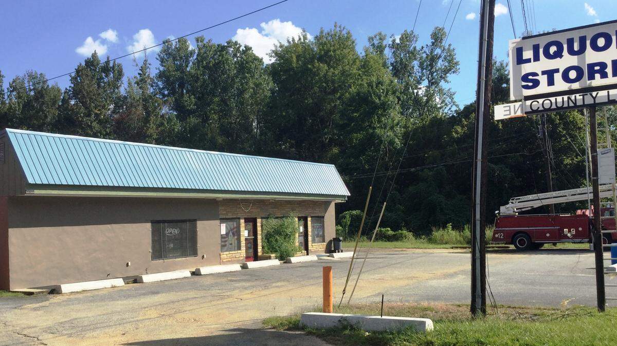 A masked gunman robbed County Line Liquors on Gray Highway on Saturday night.