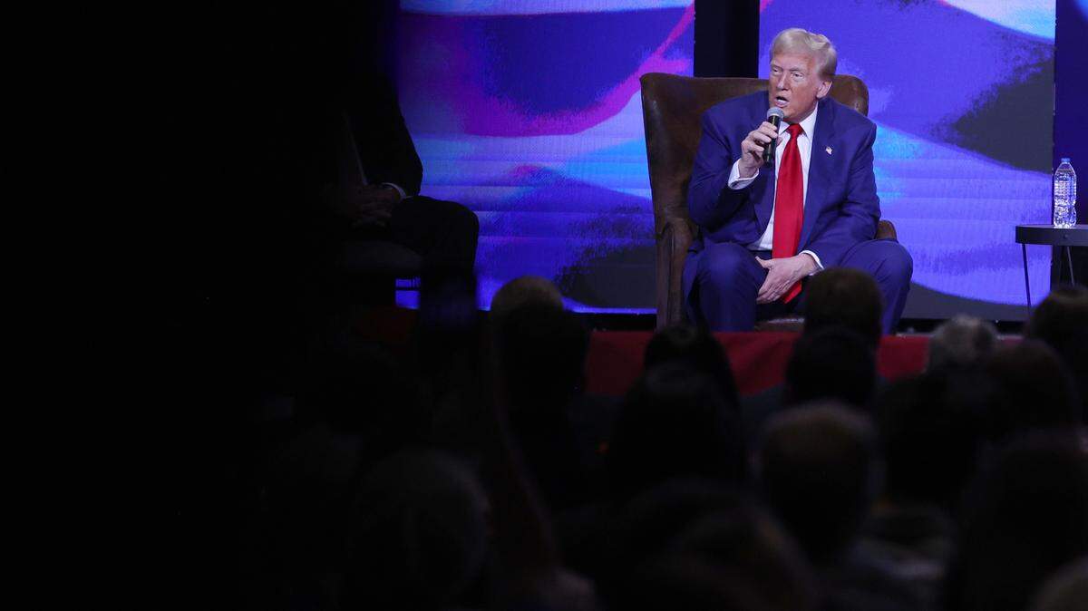 Republican presidential nominee Donald Trump addresses the crowd during the Believers and Ballots Faith Town Hall on Wednesday, Oct. 23, 2024, at Christ Church Zebulon in Zebulon, Georgia. In the first of two Georgia campaign events today, Trump took questions from Zebulon community members.