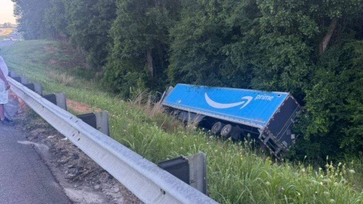 An Amazon tractor-trailer landed on the side of I-75 after running off the highway. Preliminary reports indicate that the driver fell asleep while driving, Monroe County authorities said.