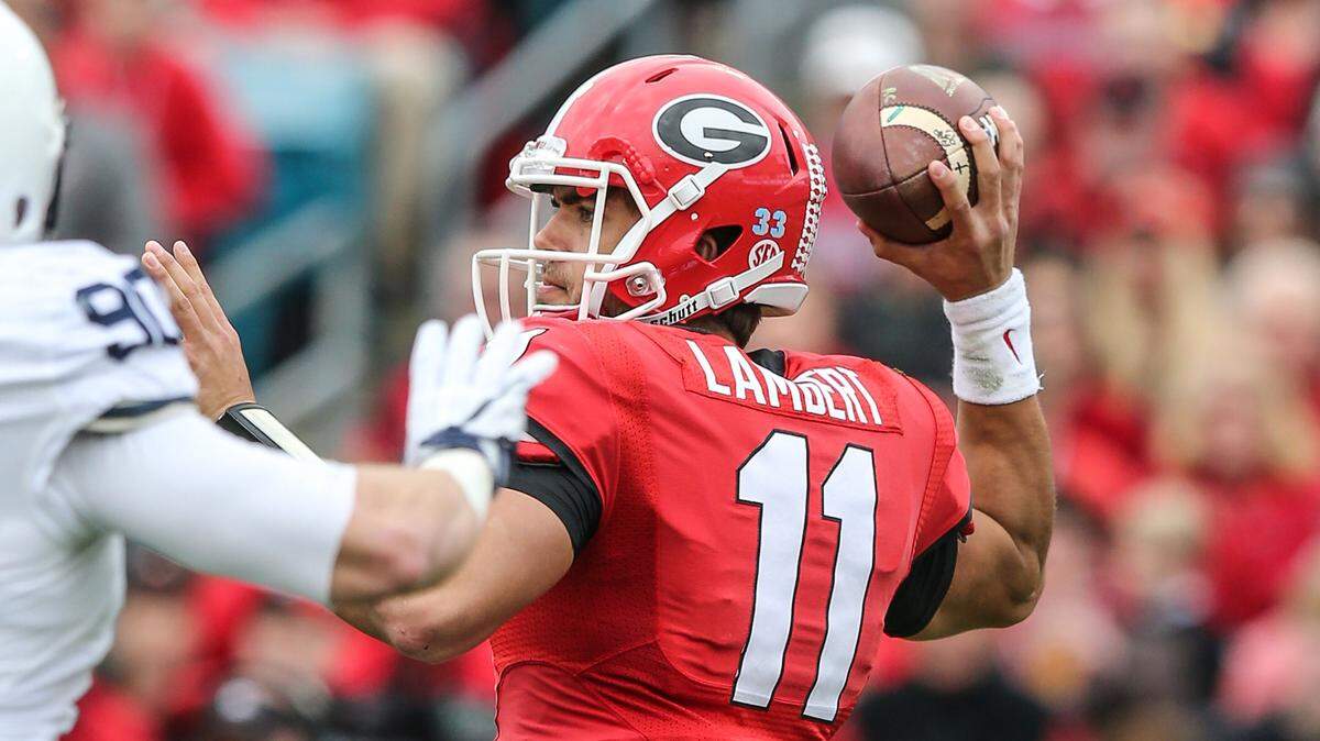 Georgia quarterback Greyson Lambert throws a pass against Penn State during the first half of the TaxSlayer Bowl NCAA college football game, Saturday, Jan. 2, 2016, in Jacksonville, Florida. Georgia won 24-17. (Gary Lloyd McCullough/The Florida Times-Union via AP) MANDATORY CREDIT
