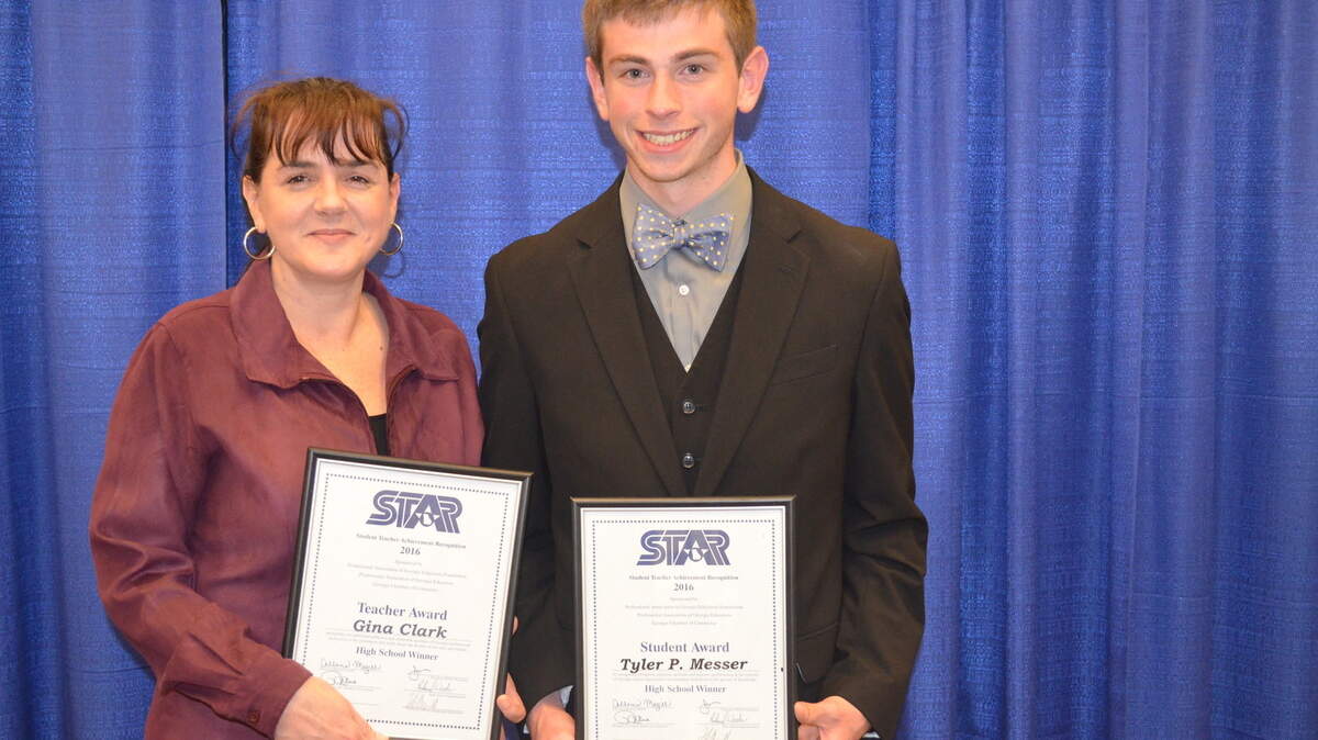 Peach County STAR Student Tyler Messer, right, chose Peach County High School's Gina Clark as his STAR Teacher.