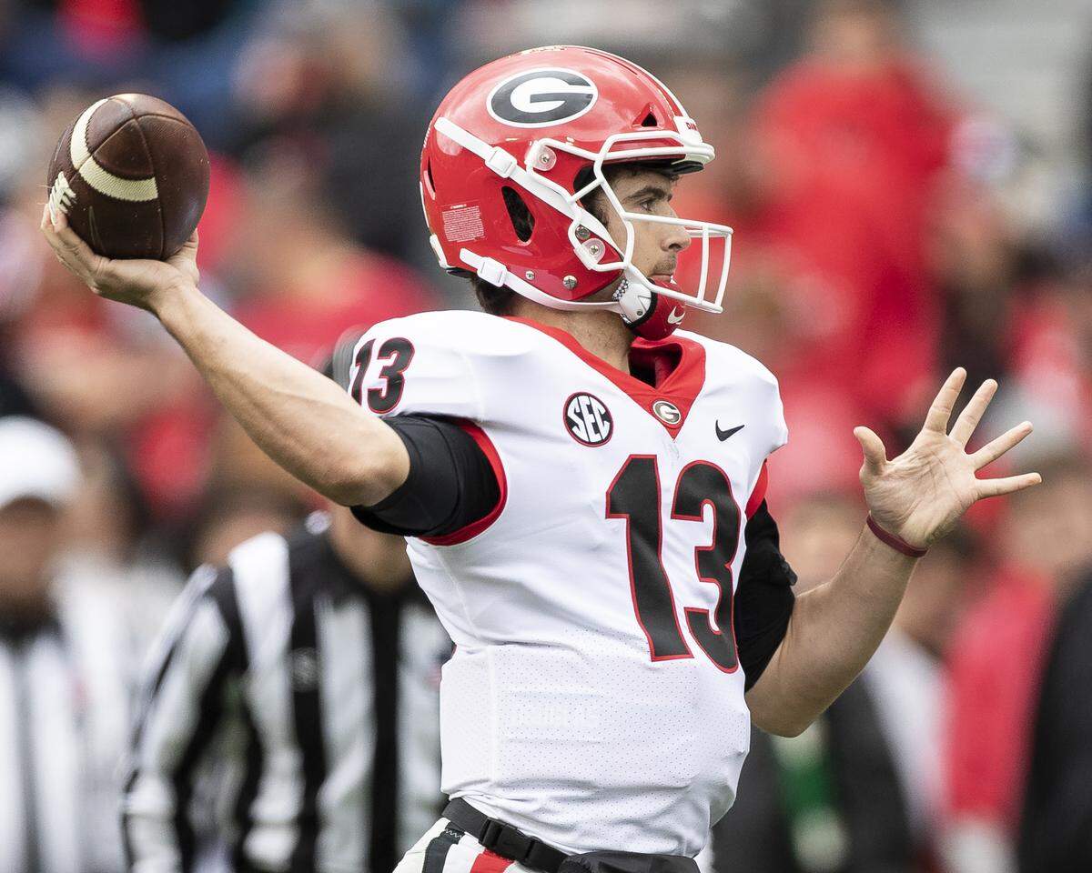 Georgia quarterback Stetson Bennett (13) throws a pass during the spring game on April 20, 2019. Final score UGA Red Team 22, UGA black Team 17.