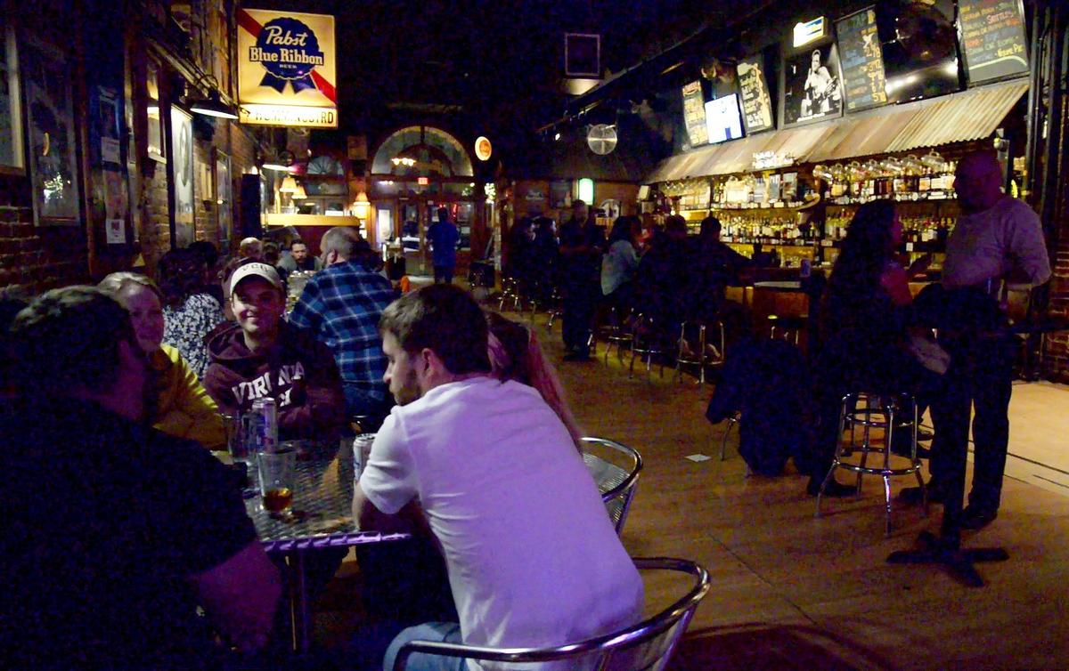 Customers of The Hummingbird Stage and Taproom participate in their weekly trivia night on Wednesday.
