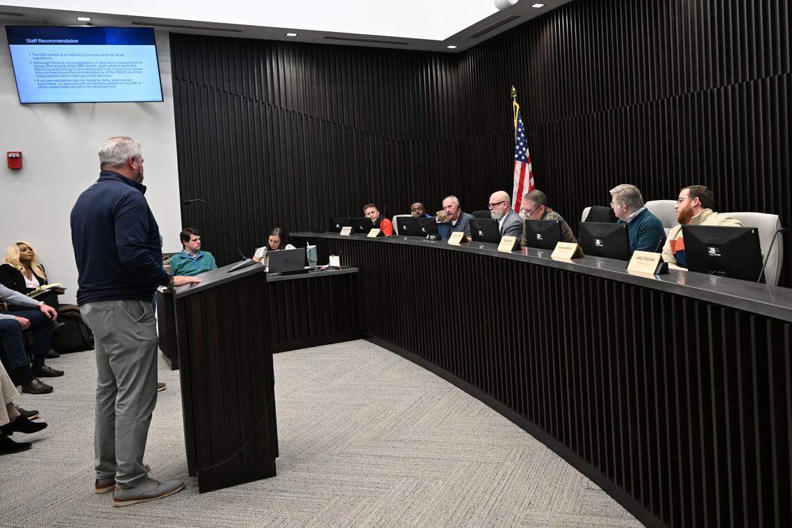 Members of the City of Forsyth Planning and Zoning Committee question Trammell Crow Co. executive vice president Drew Fredrick, left, during a meeting on Wednesday, Jan. 14, 2026, at Forsyth City Hall in Forsyth, Georgia. The commission split the vote 3-3 on approving a conditional rezoning proposal for a proposed data center in Forsyth. 