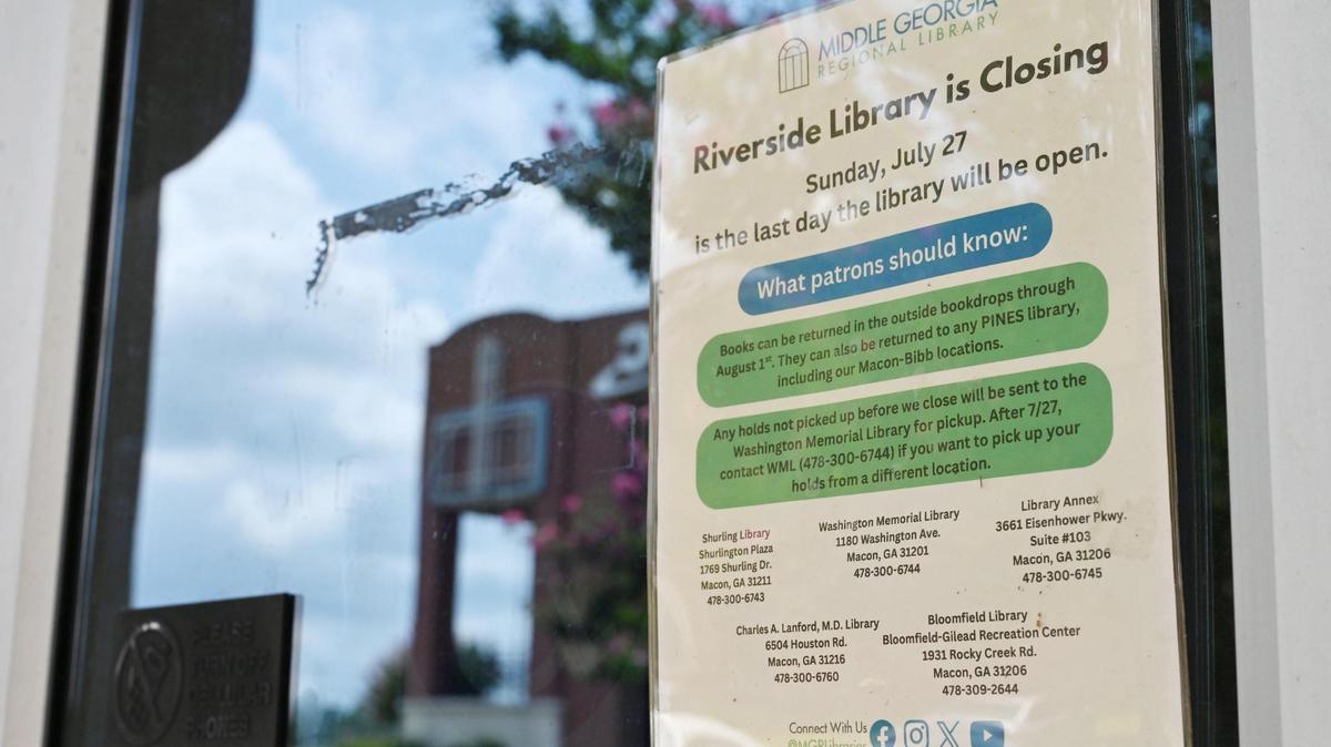 A sign sharing details about the closure of the Riverside Branch Library sits on their door on Wednesday, July 23, 2025, in Macon, Georgia. The library, which opened in 1970, will close its doors on Sunday and move to a new location on Forsyth Road.