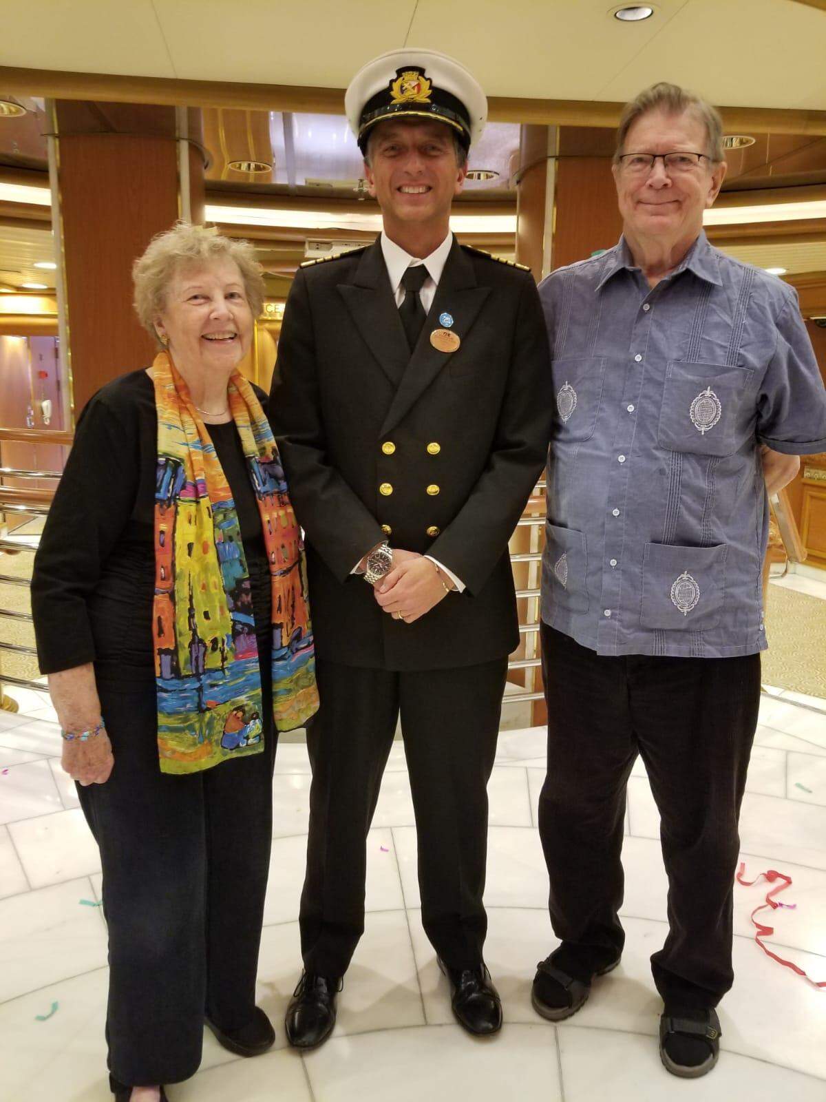 Renee and Clyde Smith, both in their 80s, are pictured with the captain of the now quarantined Diamond Princess cruise ship after renewing their wedding vows. The couple are in a Tokyo hospital after testing positive for the coronavirus but are asymptomatic and doing well, said thier son, David Smith, an attorney in Macon.
