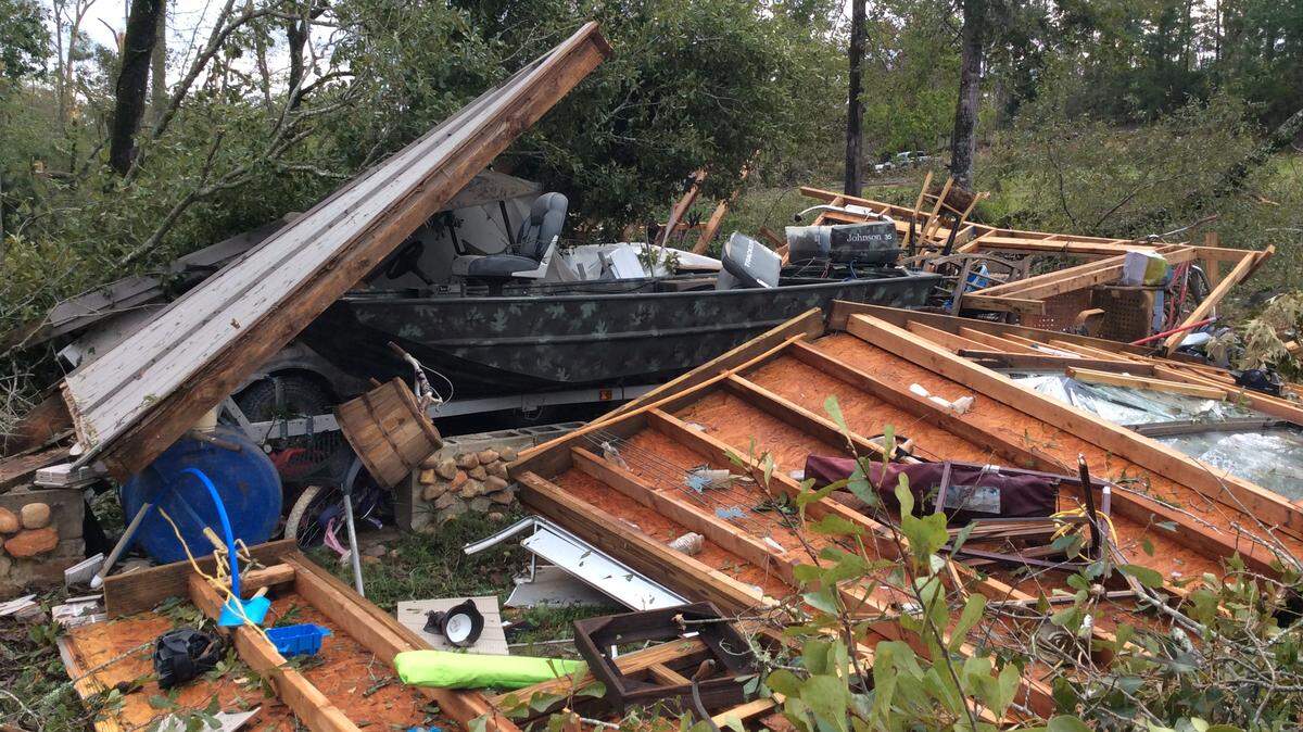 Wayne Granade’s smashed garage, or what is left of it, after a Hurricane Michael-wrought EF-1 twister destroyed it Wednesday.