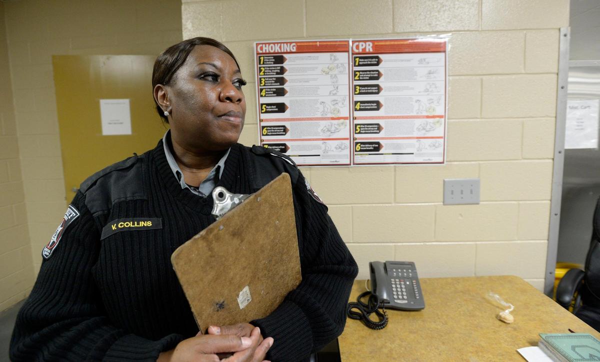 BEAU CABELL/THE TELEGRAPH Macon, Ga., 02/20/2019: Bibb Deputy Valencia Collins keeps an eye on the 17-woman shift working to put together lunches and dinners for the inmates and officers at the jail.