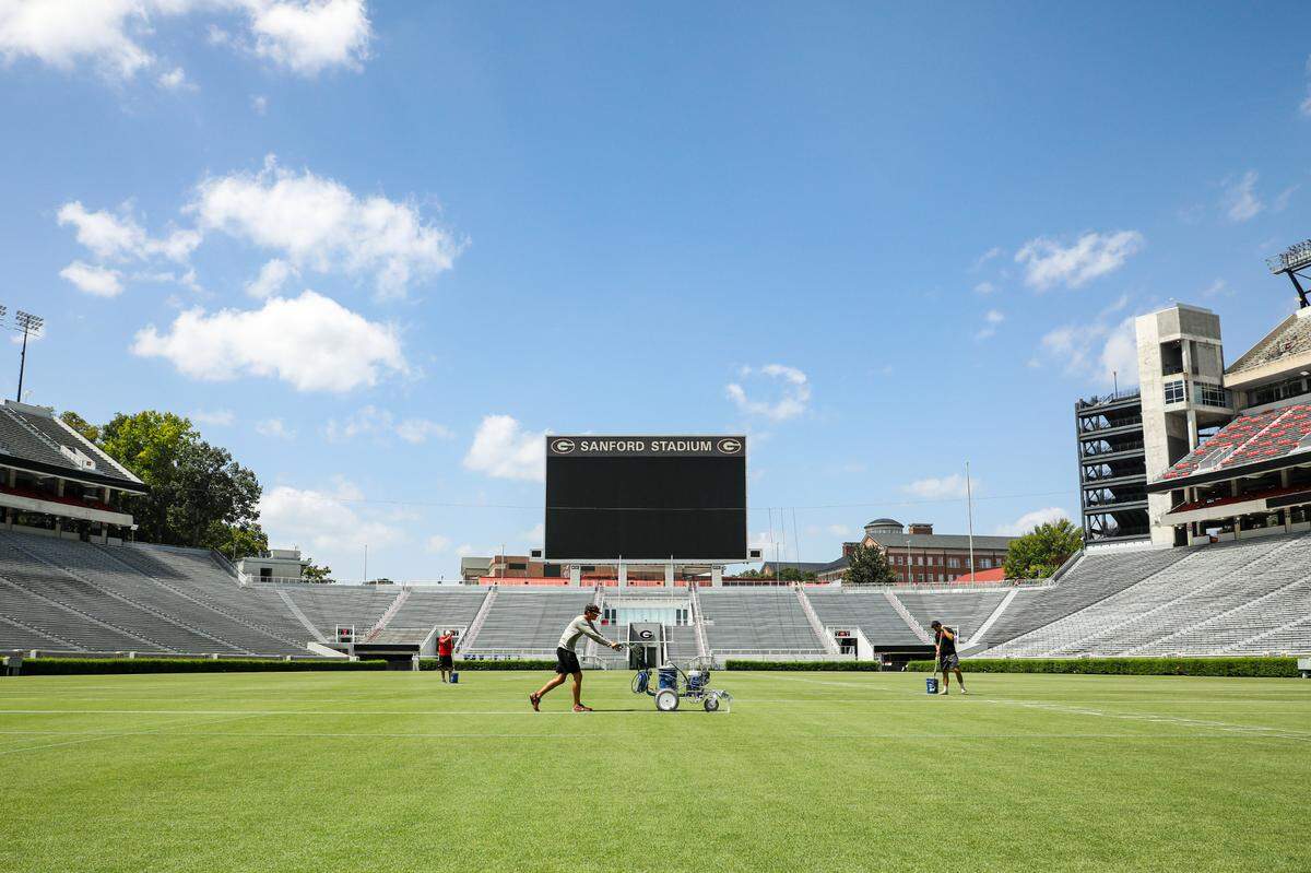Maintenance of Dooley Field at Sanford Stadium in Athens, Ga., on Thursday, Sept. 3, 2020.