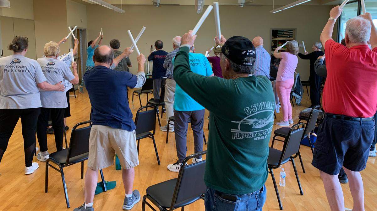 A class exercise using sticks.