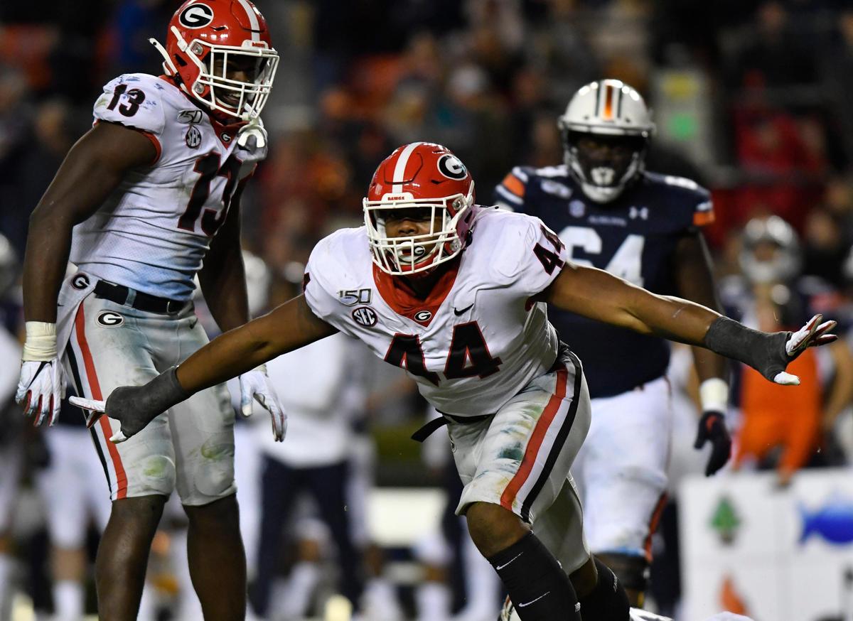 DONN RODENROTH,Auburn, Alabama, 11/16/2019: Georgia’s defensive lineman Travon Walker celebrates after tackling Auburn’s quarterback Bo Nix on fourth down on Auburn’s final drive of the game. Georgia defeated Auburn 21-14.