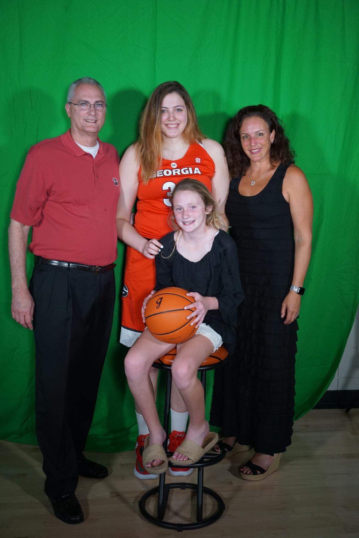 Jim Staiti (left), Jenna Staiti (back middle), Sandi Staiti (right) and Jillian Staiti (front middle) pose for a photo.