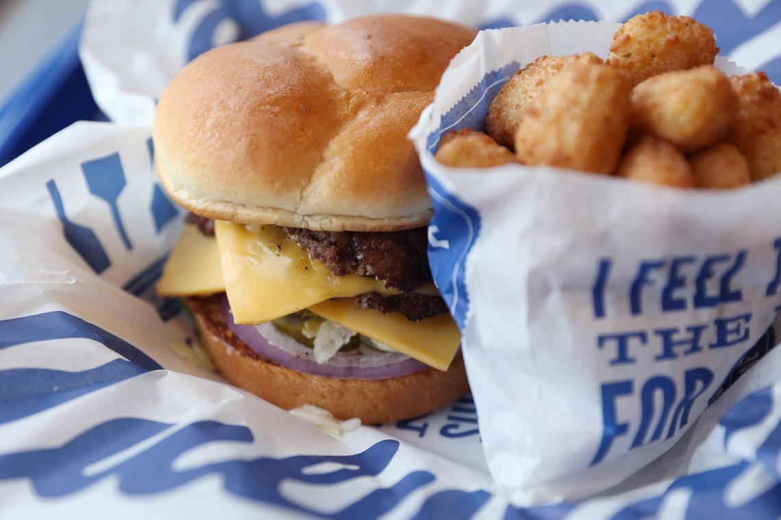 A deluxe butter burger with a side of Wisconsin cheese curds at Culver’s.