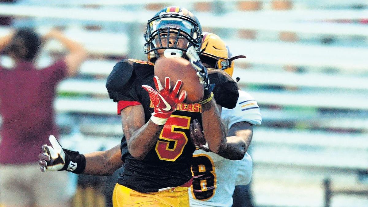 
Northeast cornerback D’icey Hopkins (5) steps in front of Perry wide receiver Taylor Lumpkin (8) as he tried to intercept a pass from Lane Rucker. Lumpkin’s defense on the play was good enough to pop the ball loose and prevent the pick. For results on Friday’s football visit macon.com.
