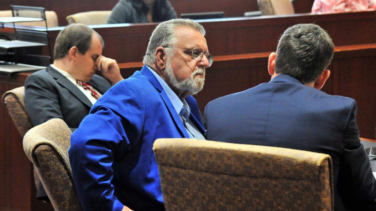 Wiley Green Leverett, center, in court in March in Houston County. He was sentenced to 35 days in the county jail for a sexual battery conviction. He now faces new child molestation and related charges.