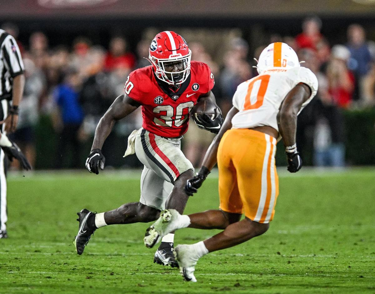 Georgia running back Dajun Edwards heads for a first down in action Saturday as the Dawgs beat Tennessee 27-13 in Athens.