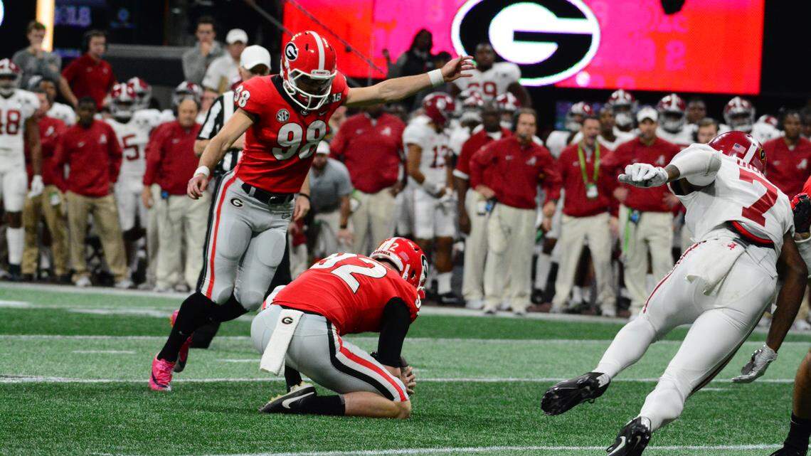 Rodrigo Blankenship attempts a field goal in the national championship against Alabama.
