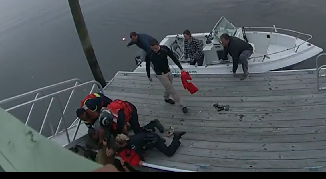 A woman who jumped from a Georgia bridge was rescued when two Savannah police officers heard “gurgling” and leaped into the river.