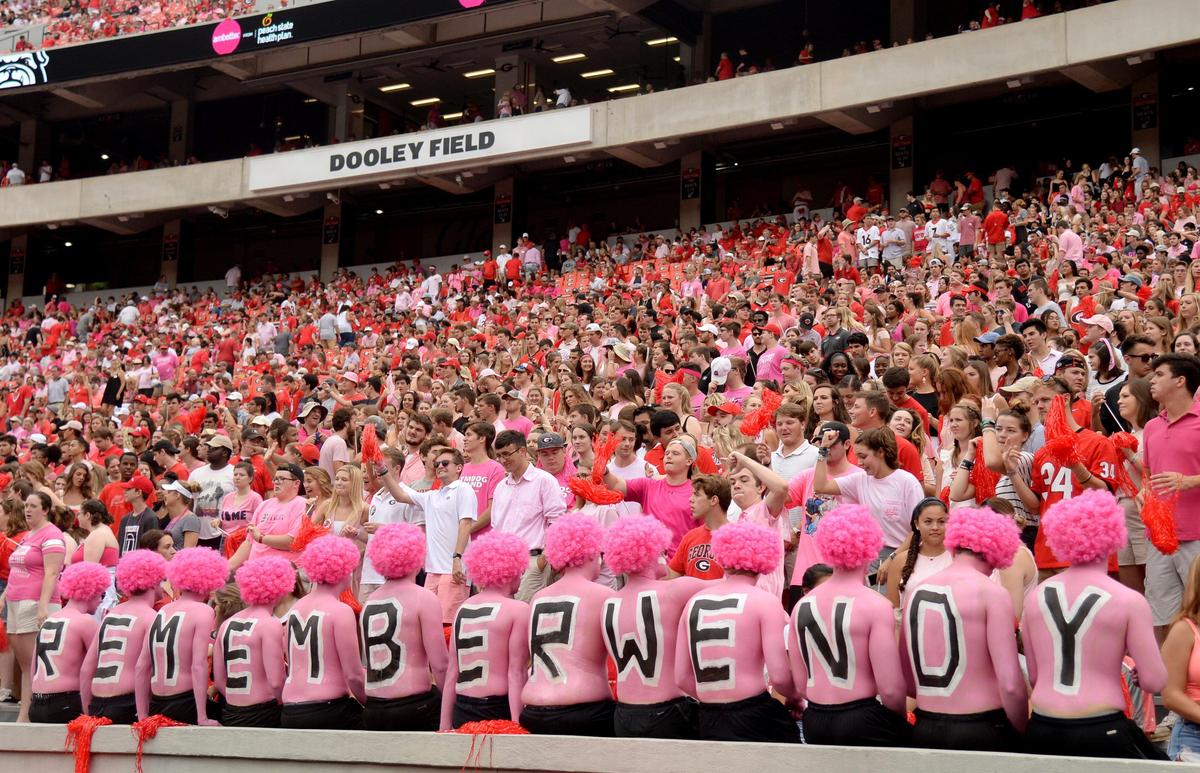 Georgia students show support for Arkansas State head coach Blake Anderson whose wife Wendy died recently of breast cancer. Fans orchestrated a Pink Out for the game.