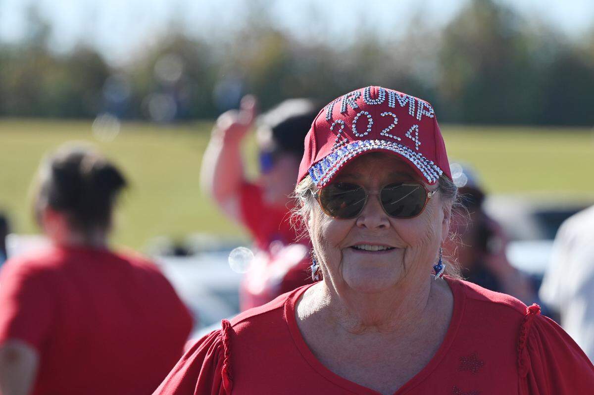 Susan Sandberg, from Griffin, Georgia, waits in line outside of Christ Church Zebulon for the Believers and Ballots Faith Townhall held by former President Donald Trump on Wednesday, Oct. 23, 2024, at Christ Church Zebulon in Zebulon, Georgia. 