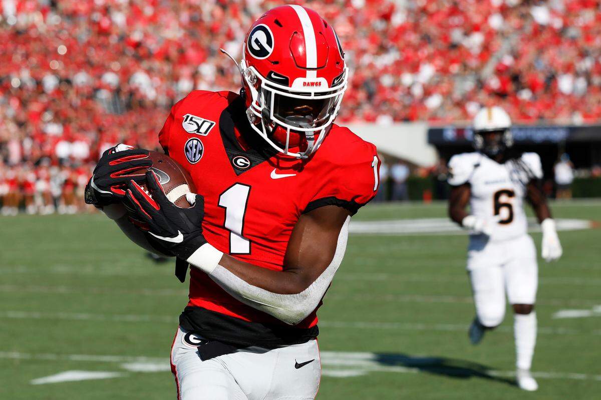 Georgia wide receiver George Pickens (1) catches a pass from quarterback Jake Fromm in the end zone for a touchdown in the first half of an NCAA college football game against Murray State, Saturday, Sept. 7, 2019, in Athens, Ga.