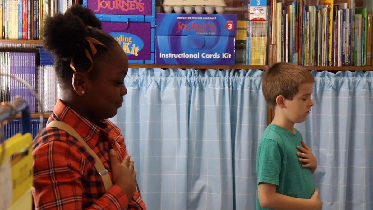 Students at Alex II Magnet School run through four minutes of breathing exercises on a recent morning. The students are participating in a pilot program that could expand to more Bibb County schools in 2020.