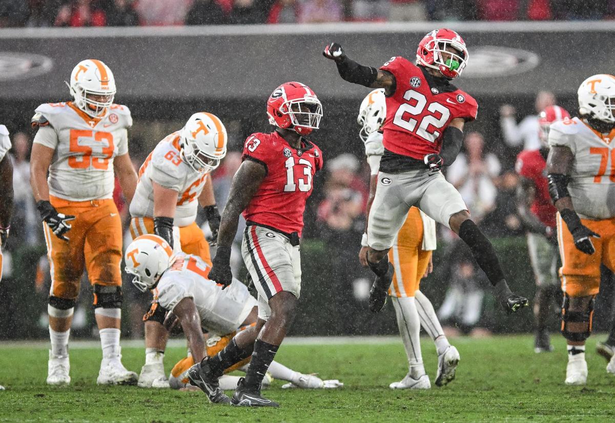 Georgia defensive back Javon Bullard celebrates after sacking Tennessee quarterback Hendon Hooker Saturday in Athens as the Dawgs beat Tennessee 27-13.