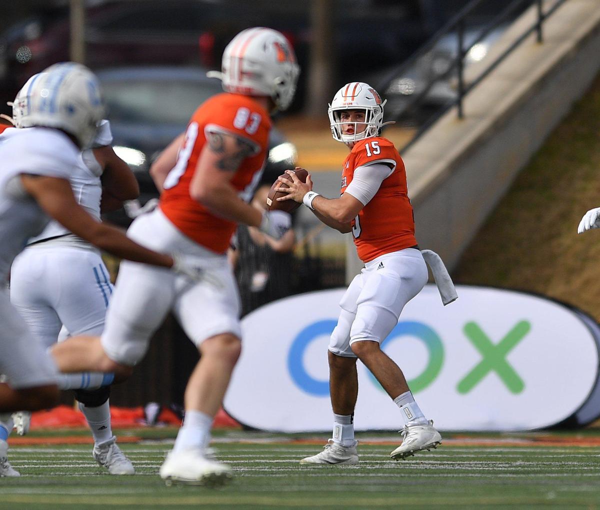 DONN RODENROTH,Macon, Georgia, 02/27/2021: Mercer quarterback Carter Peevey connects with Mercer tight end Drake Starks (83) on the opening play for a 75 yard touchdown against the Citadel.