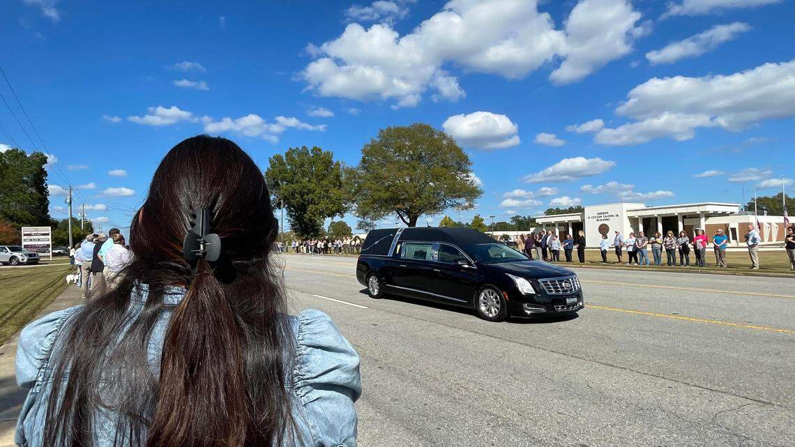 Crowds give emotional farewell to Houston County Sheriff Talton during funeral procession