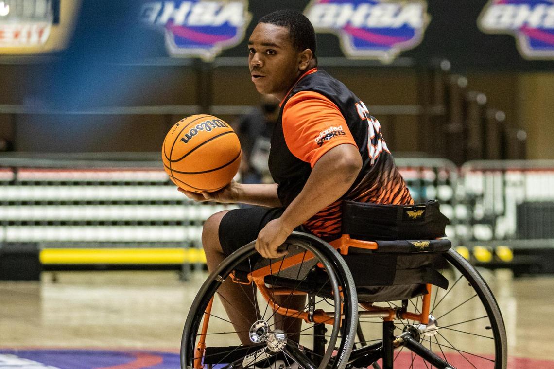 Houston County’s Adonis Brown (25) looks for an open teammate against the Gwinnett Heat in the GHSA Championship March 13.