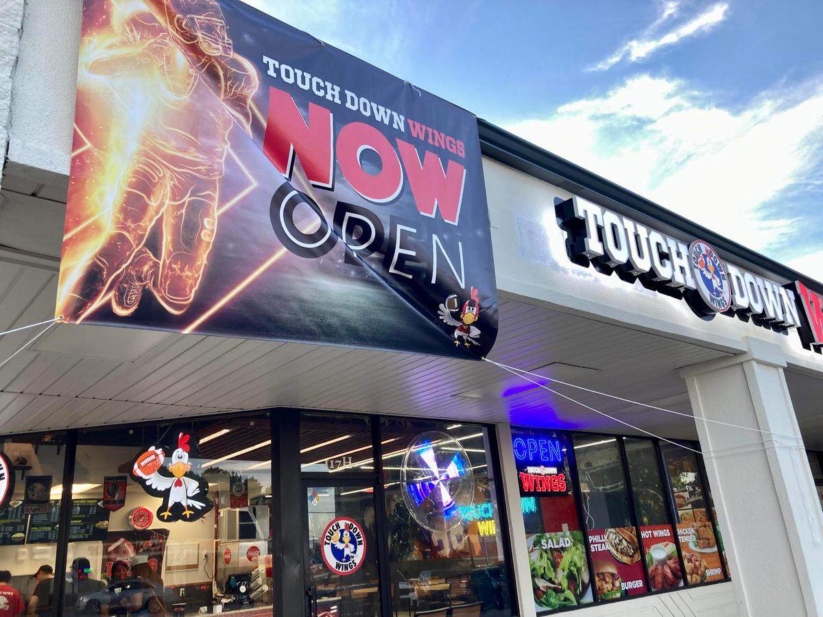 A new TouchDown Wings opened Monday next to Shells Seafood Restaurant in the Kroger shopping center off Russell Parkway in Warner Robins.