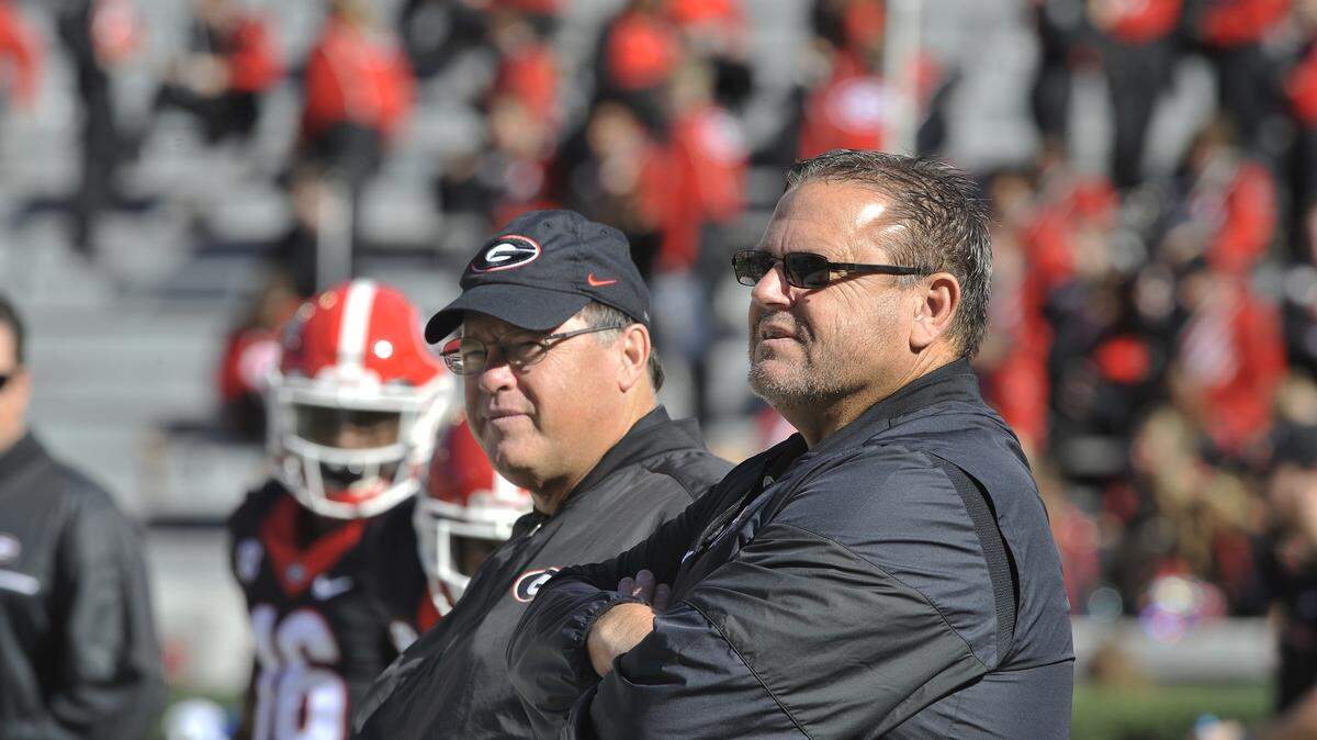 Georgia offensive coordinator Jim Chaney Georgia offensive line coach Sam Pittman (Photo by Philip Williams)
