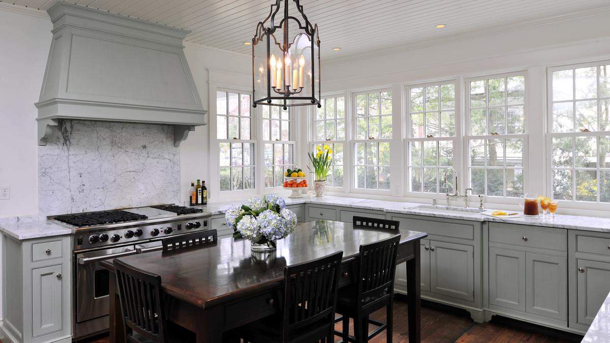 Washington architect Christopher Snowber designed this kitchen for the Chevy Chase, Maryland, home of Amy and Richard Zantzinge. Wood floors continue to rule in remodeled kitchens.