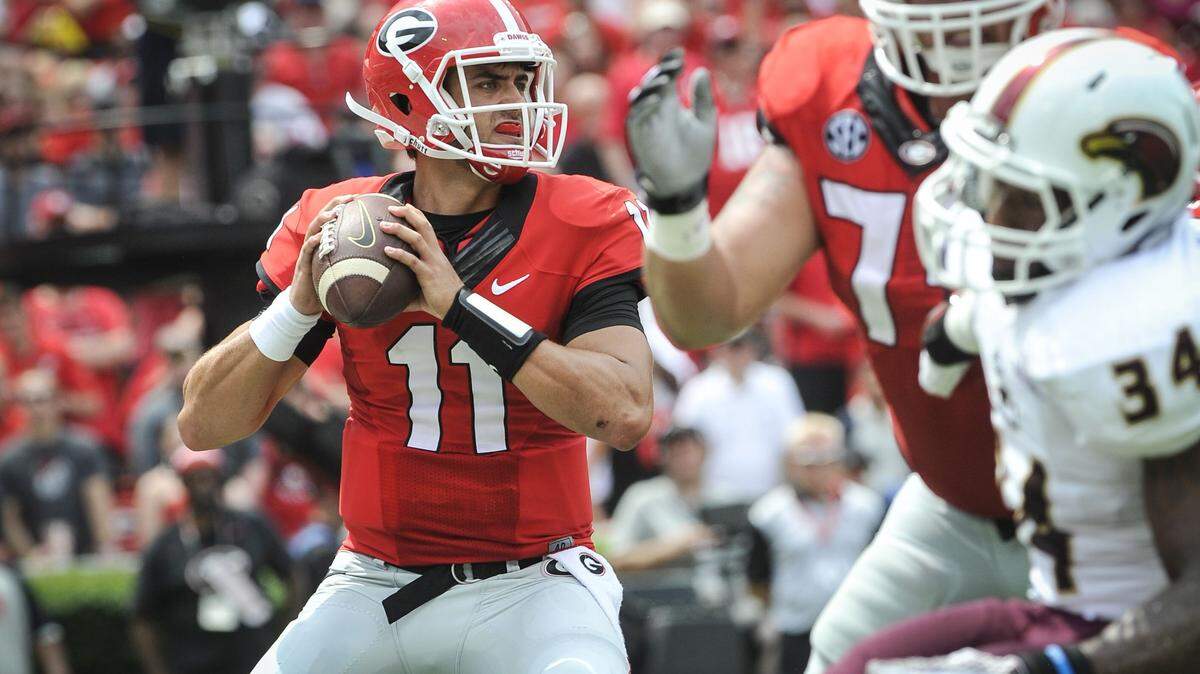 FILE - In this Sept. 5, 2015, file photo, Georgia quarterback Greyson Lambert drops back to pass against Louisiana Monroe during the first half of an NCAA college football game in Athens, Ga. Lambert set an NCAA single-game record for passing accuracy last week by going 24 of 25 in the seventh-ranked Bulldogsí blowout of South Carolina. (AP Photo/John Amis, File_