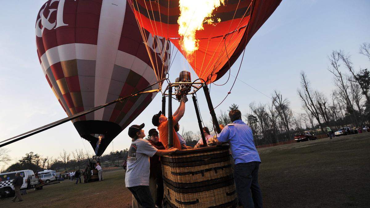 TELEGRAPH FILE PHOTO
Hot air balloons prepared to take off at Tunes and Balloons in 2013.