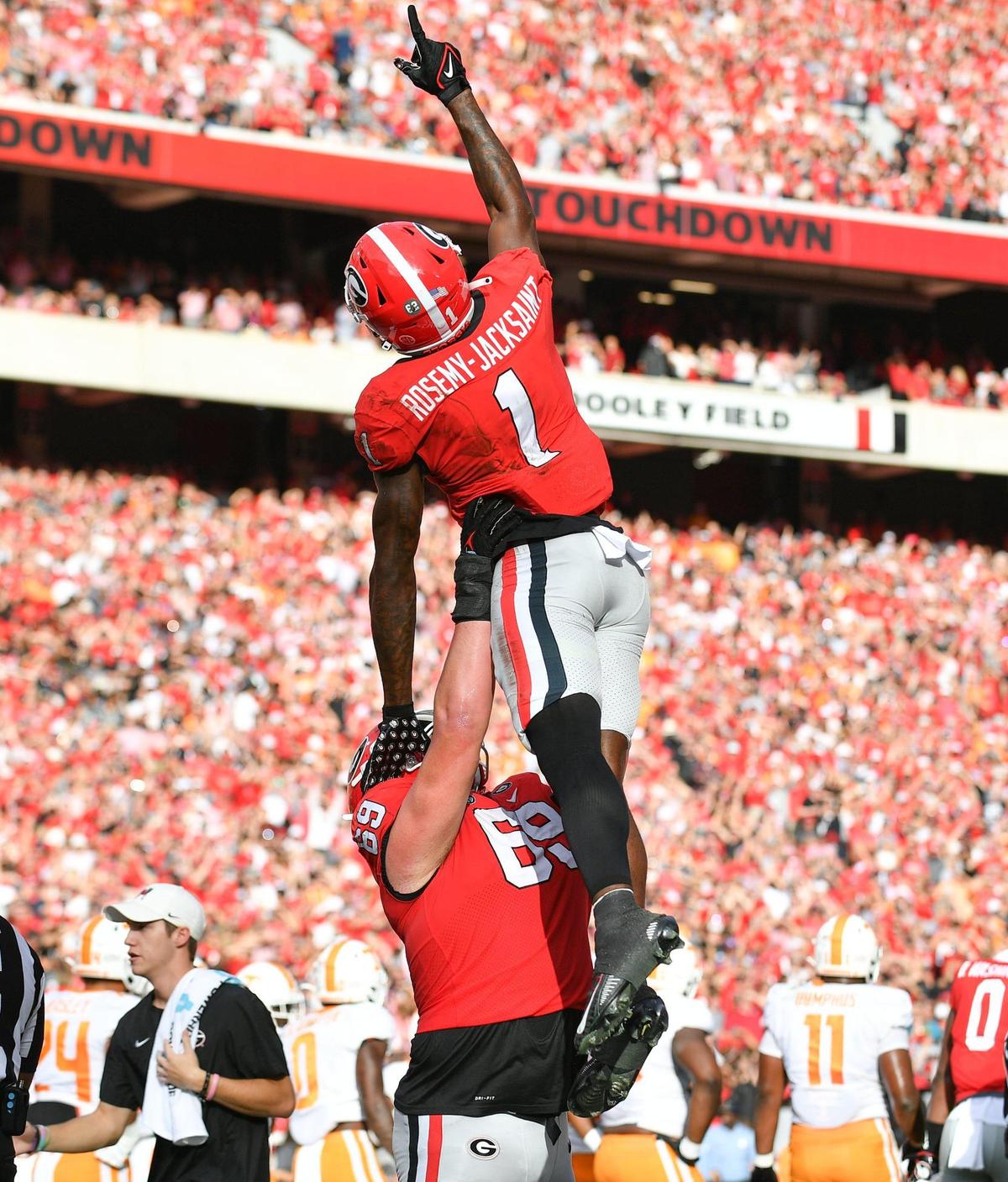 Bulldog Marcus Rosemy-Jacksaint celebrates after his touchdown against the Tennessee Saturday in Athens.