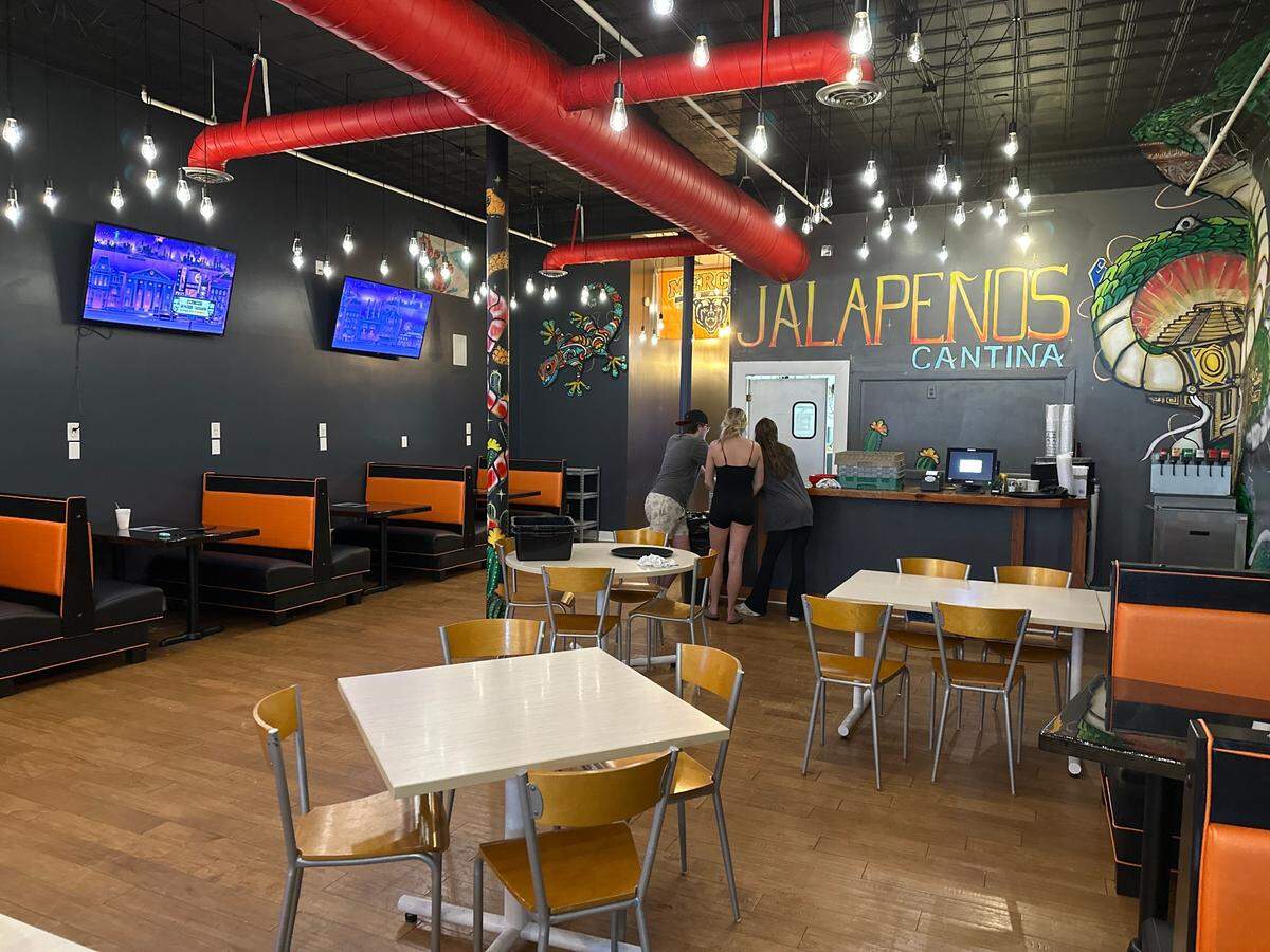 Jalapenos Cantina makes Macon debut with soft opening. Menu items include molcajete, chipotle chicken, chilaquiles and more.