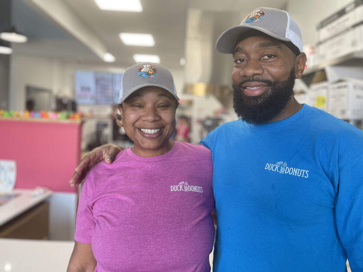 Duck Donuts Warner Robins franchise owners and life partners Naomi Smith and Ron Harris of Macon.