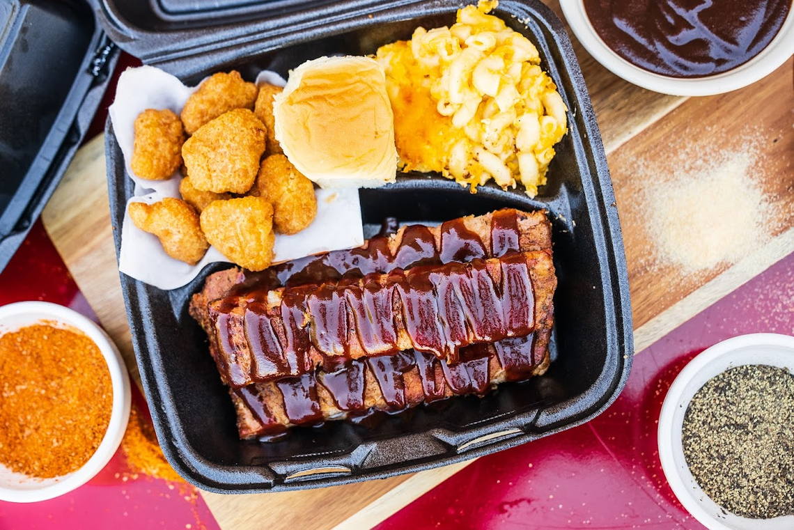 A rib plate with smoked mac and cheese and fried corn nuggets at Big D’s Bar-B-Q at 280 Carl Vinson Parkway in Warner Robins.