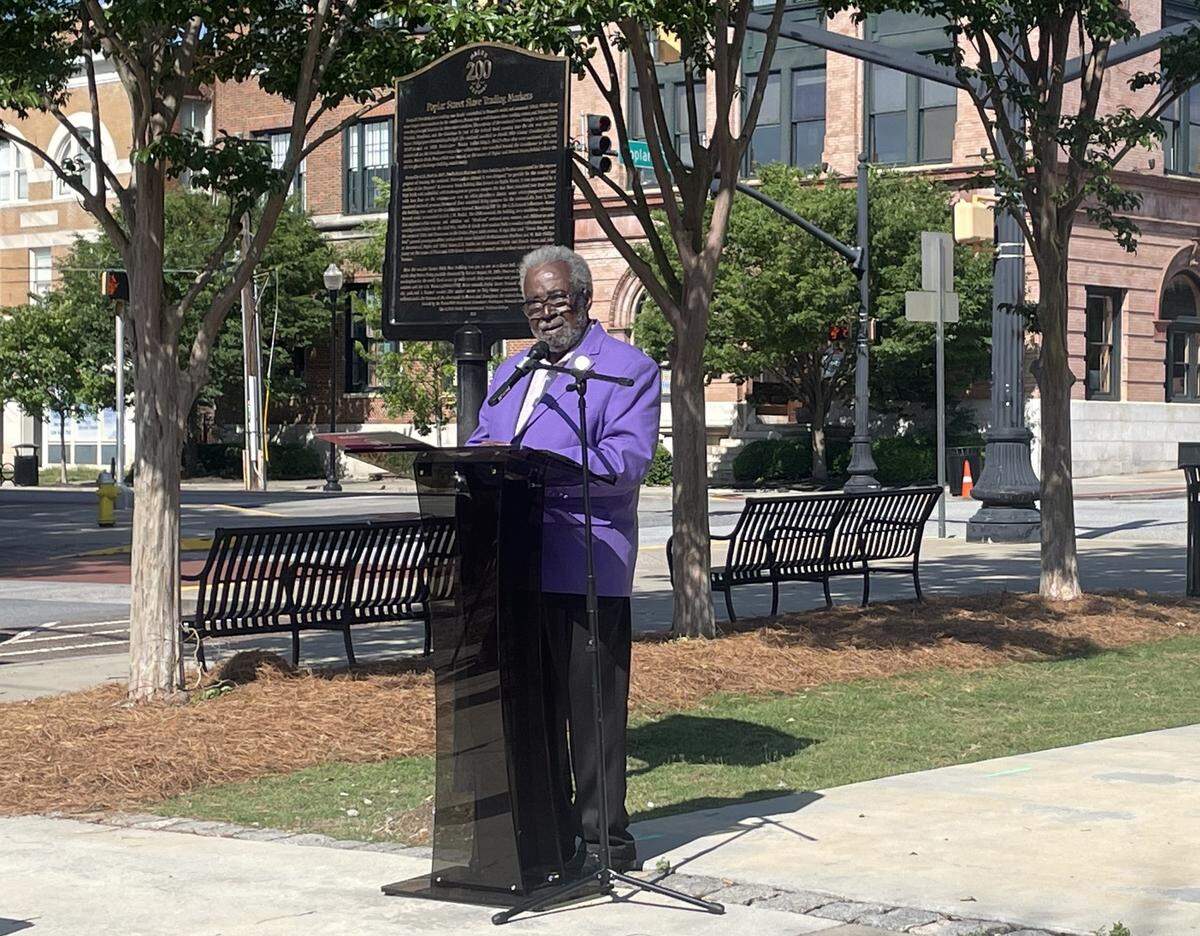 Alex Habersham, founder of Macon-Middle Georgia Black Pages speaks at a press conference Monday for the unveiling of markers dedicated to Macon’s Black history.