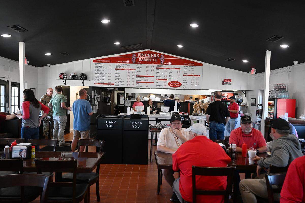 Customers on opening day of the new Fincher’s Barbecue on Friday, May 15, 2026 in Warner Robins, Georgia. The new restaurant is off South Armed Forced Boulevard, across the street from Robins Air Force Base.