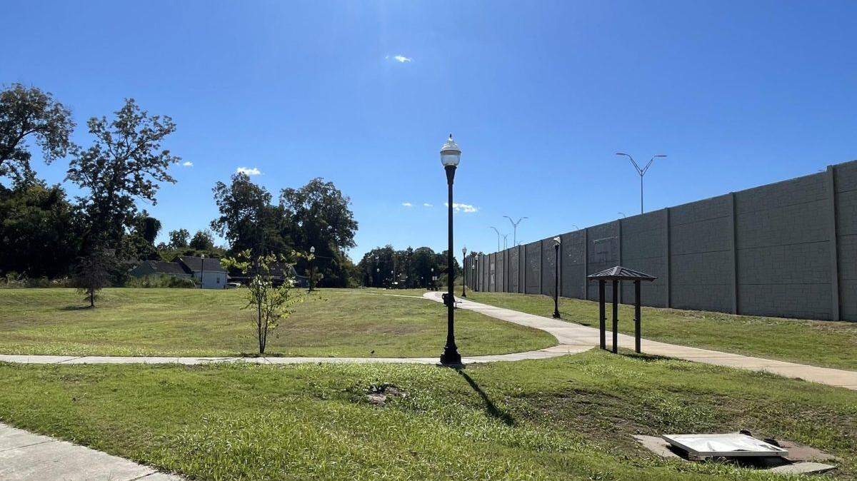 Linear Park in the historic Pleasant Hill neighborhood is separated from Interstate 75 by a barrier wall and runs between Walnut Street and First Avenue where Middle Street once was.