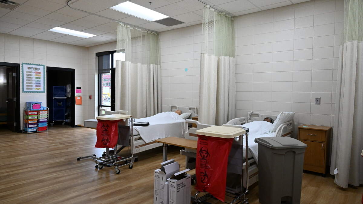 Training mannequins lay in hospital beds in a classroom at the Monroe County College and Career Academy as a part of the health science pathway on Thursday, Aug. 14, 2025, in Forsyth, Georgia. The new facility welcomed students on August 1 and offers updated, state of the art career training. 