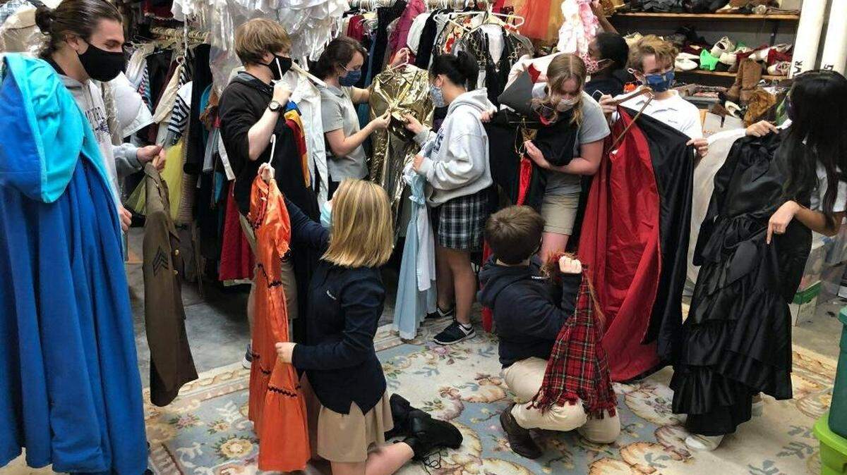 Theater students at Stratford Academy search the school’s costumes for outfits to wear when they take part in Macon Little Theatre and the Museum of Arts and Sciences’ Heroes and Villains Ramble Saturday from 6 to 9 p.m.