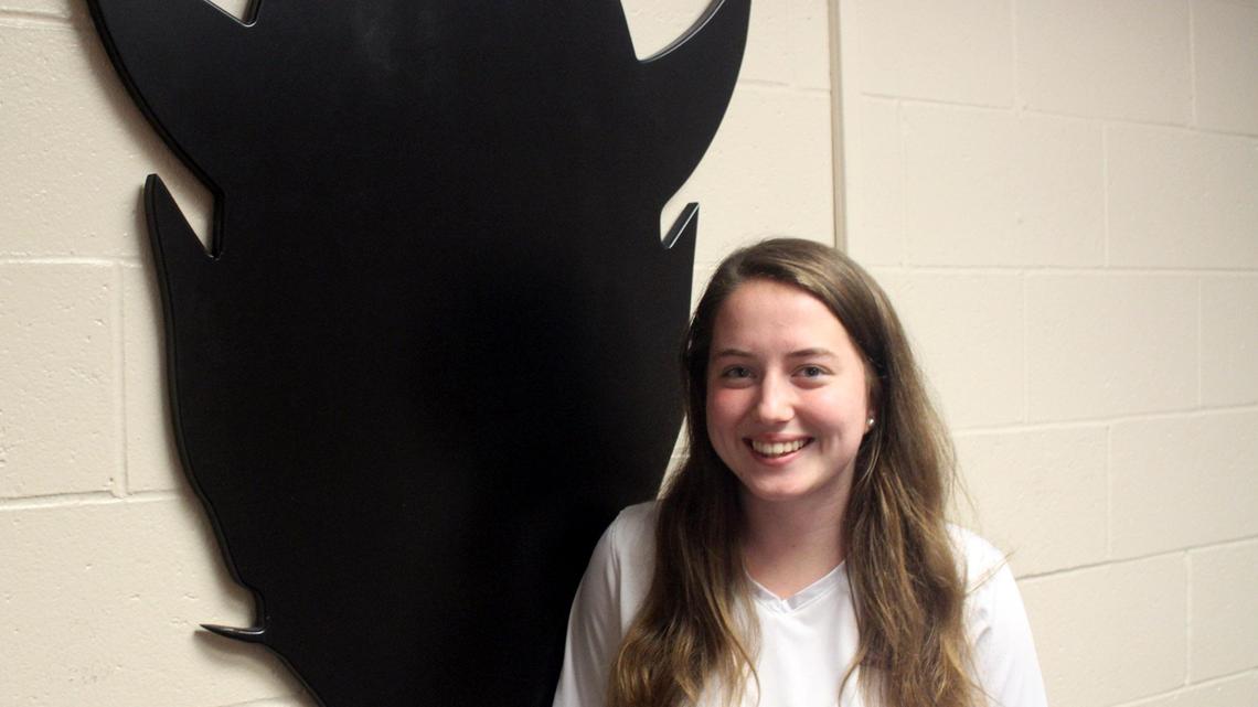 In February, Warner Robins High School senior and soccer player Alyssa Key poses with her school mascot in celebration of her 100th goal.