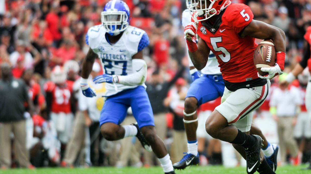 Georgia receiver Terry Godwin (5) runs in to the end zone during Saturday's game against the Kentucky Wildcats at Sanford Stadium in Athens, Ga., on Saturday, Nov. 7, 2015. (Photo by Sean Taylor)